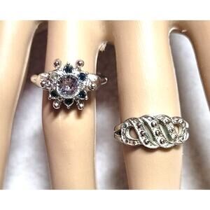 Lot of 2 Avon Rings Size 7-7.25 1980 Monaco Band 1974 Starsong Flower Silvertone